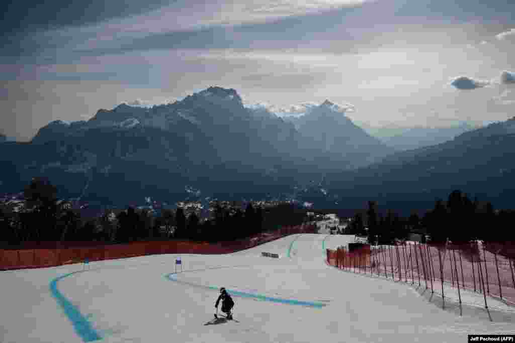 An unidentified competitor heads down a slalom track on March 9.The Olympic Charter states that “No kind of demonstration or political, religious or racial propaganda is permitted in any Olympic sites, venues or other areas.”