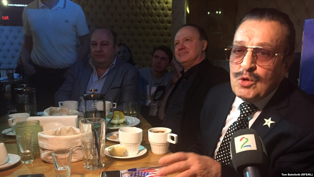 Russian emigre singer-songwriter Willi Tokarev (right) crooned a paean to Trump’s victory titled Trumplissimo America.