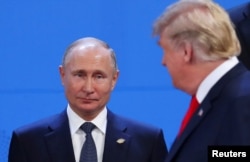 Fotografi arkivi: Vladimir Putin dhe Donald Trump. Nëntor, 2018.