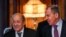 French Foreign Minister Jean-Yves Le Drian (left) speaks with Russian counterpart Sergei Lavrov during their meeting in Moscow on February 27.