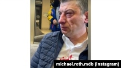 Georgian opposition politician Giorgi Gakharia shown with blood on his shirt after being attacked on January 15.