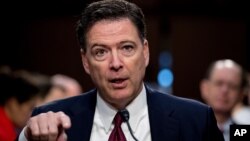 Bivši direktor FBI James Comey tokom saslušanja u Senatu, 8. juni 2017.