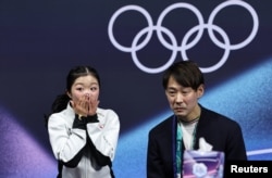 Ами Накаи Олимпиаданың қола жүлдесін алғанын түсінген сәт. Милан, Италия, 19 ақпан, 2026 жыл.