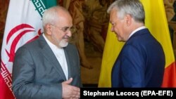 Министр иностранных дел Ирана Мохаммад Джавад Зариф (слева) и министр иностранных дел Бельгии Дидье Рейндерс. Брюссель, 15 мая 2018 года.