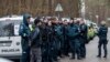 Полицейские возле дома Леонида Волкова в Вильнюсе, где на политика напали неизвестные