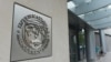 The seal of the International Monetary Fund is seen on a headquarters building in Washington