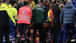 Medics carry Hungary's assistant coach Adam Szalai from the pitch during the UEFA Nations League soccer match between Netherlands and Hungary in Amsterdam on November 16.