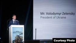 Ukrainian President Volodymyr Zelenskiy speaks at a dinner honoring Holocaust survivors in Krakow, Poland, on January 26.