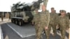 Azerbaijan - President Ilham Aliyev inspects weapons put on display at the site of exercises held by the Azerbaijani army, 26Jun2014.