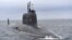 The Project 885M Yasen class Kazan nuclear-powered submarine arrives at its permanent deployment base of the Russian Navy Northern Fleet in the Murmansk region in June 2021. 