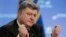 Украина президенті Петр Порошенко баспасөз мәслихатын өткізіп отыр. Киев, 25 қыркүйек 2014 жыл.  