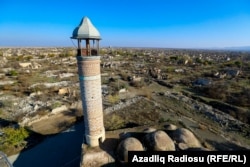 A view of ruins in the town of Agdam bordering Nagorno-Karabakh on November 24. Azerbaijani armed forces retook Agdam and two other districts previously controlled by Armenia as part of a November 9 agreement that ended the worst fighting in the region since the 1990s. (Azadliq Radiosu, RFE/RL)
