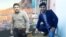 RFE/RL journalists Sabawoon Kakar (left) and Abadullah Hananzai (composite file photo)