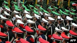 IRGC troops march during celebrations on Tehran's Azadi Square to mark the 37th anniversary of the Islamic Revolution in February 2016.