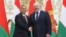 Hungarian Prime Minister Viktor Orban (left) and Belarusian President Alyaksandr Lukashenka pose for a photo during their meeting in Minsk on June 5.