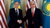 Kazakh President Qasym-Zhomart Toqaev (right) shakes hands with U.S. Secretary of State Antony Blinken during a meeting in Astana on February 28.