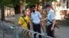 Police officers arrest a local resident in the Crimean capital, Simferopol. (file photo)