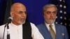 Afghanistan's presidential candidate Ashraf Ghani (left) with his rival Abdullah Abdullah