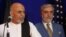 Afghanistan's presidential candidate Ashraf Ghani (left) with his rival Abdullah Abdullah