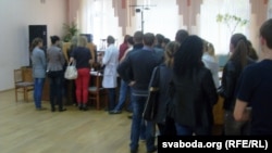 Students line up to vote early at a polling station in Vitsebsk on September 22.