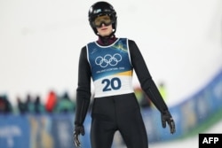 19 жастағы Илья Мизерных шаңғымен үлкен тұғырдан секіруде 8-орын алды.