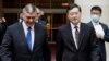 Chinese Foreign Minister Qin Gang (front right) walks with Russian Deputy Foreign Minister Andrei Rudenko (left) in Beijing on June 25, the day China said it "supports Russia in safeguarding national stability and delivering development and prosperity." 