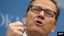 German Foreign Minister Guido Westerwelle (in file photo) summoned the Syrian ambassador to tell him that such activities will not be tolerated.