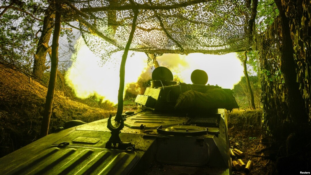 A self-propelled howitzer of the Ukraine's 57th Brigade fires in the direction of Russian positions on the outskirts of Kupyansk on April 21. 