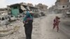 An Iraqi woman fleeing Mosul on July 7.