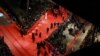 People arrive on the red carpet for the screening of "The Grandmaster" at the Berlinale on February 7.