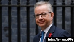 Senior cabinet minister Michael Gove said the report was "going through the appropriate procedure," adding that it will be published "in due course."