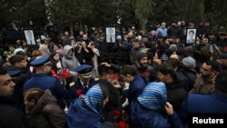 Funeraliile membrilor echipajului aeronavei Azerbaidjan Airlines căzut la Aktau. (Baku, 29 decembrie 2024.)