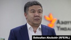 Алмамбет Шыкмаматов.