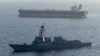 Guided-missile destroyer USS Rafael Peralta (DDG 115) enforces the US blockade of Iranian ports against the ship M/T Stream after it attempted to sail to an Iranian port, on April 26.