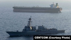 Guided-missile destroyer USS Rafael Peralta (DDG 115) enforces the US blockade of Iranian ports against the ship M/T Stream after it attempted to sail to an Iranian port, on April 26.