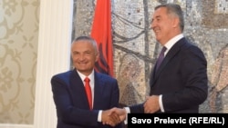 Albanian President Ilir Meta (left) with the prime minister of Montenegro, Milo Djukanovic, in 2016