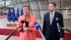 European Commissioner for Home Affairs Ylva Johansson (left) and Czech Interior Minister Vit Rakusan address a press conference at a meeting of EU interior ministers at the European Council building in Brussels on December 8.