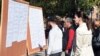 Armenia - People read vacancy notices at an open-air job fair in Yerevan, 9Oct2017.