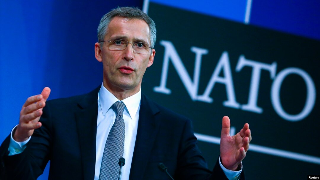 NATO Secretary-General Jens Stoltenberg speaks to reporters in Brussels about the alliance's plans to bolster its eastern flank.
