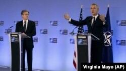 NATO Secretary-General Jens Stoltenberg (right), and U.S. Secretary of State Antony Blinken address a press conference prior to a meeting of NATO foreign ministers in Brussels on March 23. 