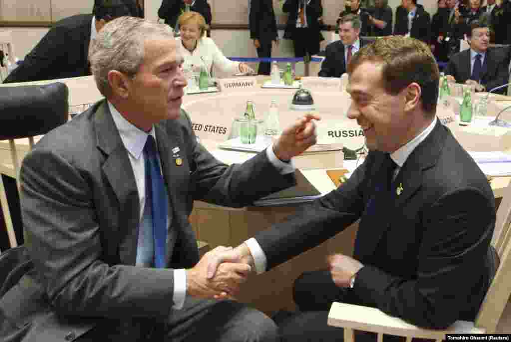 The Russian president meets with U.S. President George W. Bush before the start of a Group of Eight (G8) working session in northern Japan on July 8, 2008. Medvedev cultivated a more pro-Western image than his predecessor, and made gestures toward cracking down on corruption.&nbsp;