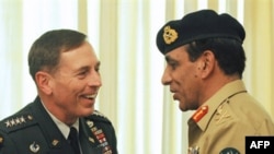 Pakistan's Army Chief General Ashfaq Kayani (right) meets with U.S. General David Petraeus in Islamabad.