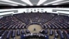 Члени Європейського парламенту беруть участь у голосуванні під час пленарного засідання в Європейському парламенті в Страсбурзі, Франція, 13 березня 2024 року
