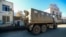 NAGORNO-KARABAKH -- An Azeri military truck drives drives along a street in Hadrut town, November 25, 2020