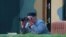 NORTH KOREA -- North Korean leader Kim Jong Un watches the test-fire of two short-range ballistic missiles at an undisclosed location, July 25, 2019