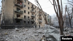 Житловий будинок, сильно пошкоджений під час російського ракетного обстрілу Харкова, 23 січня 2024 року