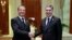 Turkmen President Gurbanguly Berdymukhammedov (right) meets with Russian Prime Minister Dmitry Medvedev in Turkmenbashi on August 12. 