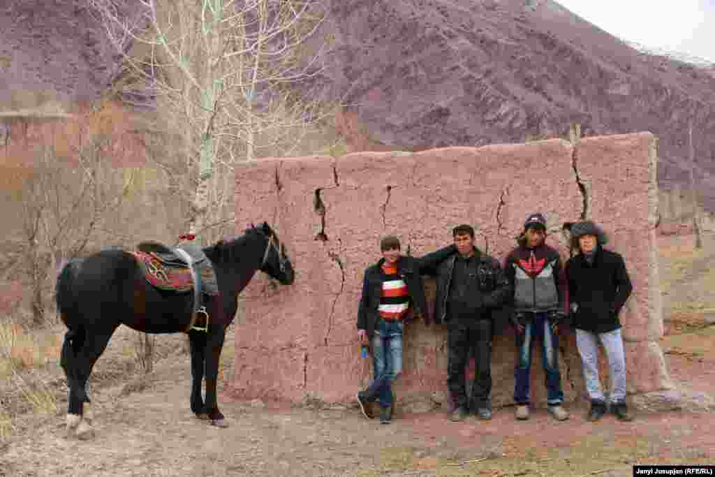 Nazim&rsquo;s son Akhmat (second from the left) with friends. They spend most of their free time riding horses to train for buzkashi, the popular sport that involves dragging a goat by horseback toward a goal. It is the major winter entertainment in all of Jerge-Tal district. Sometimes they also act as volunteer guides for the occasional foreign tourist.