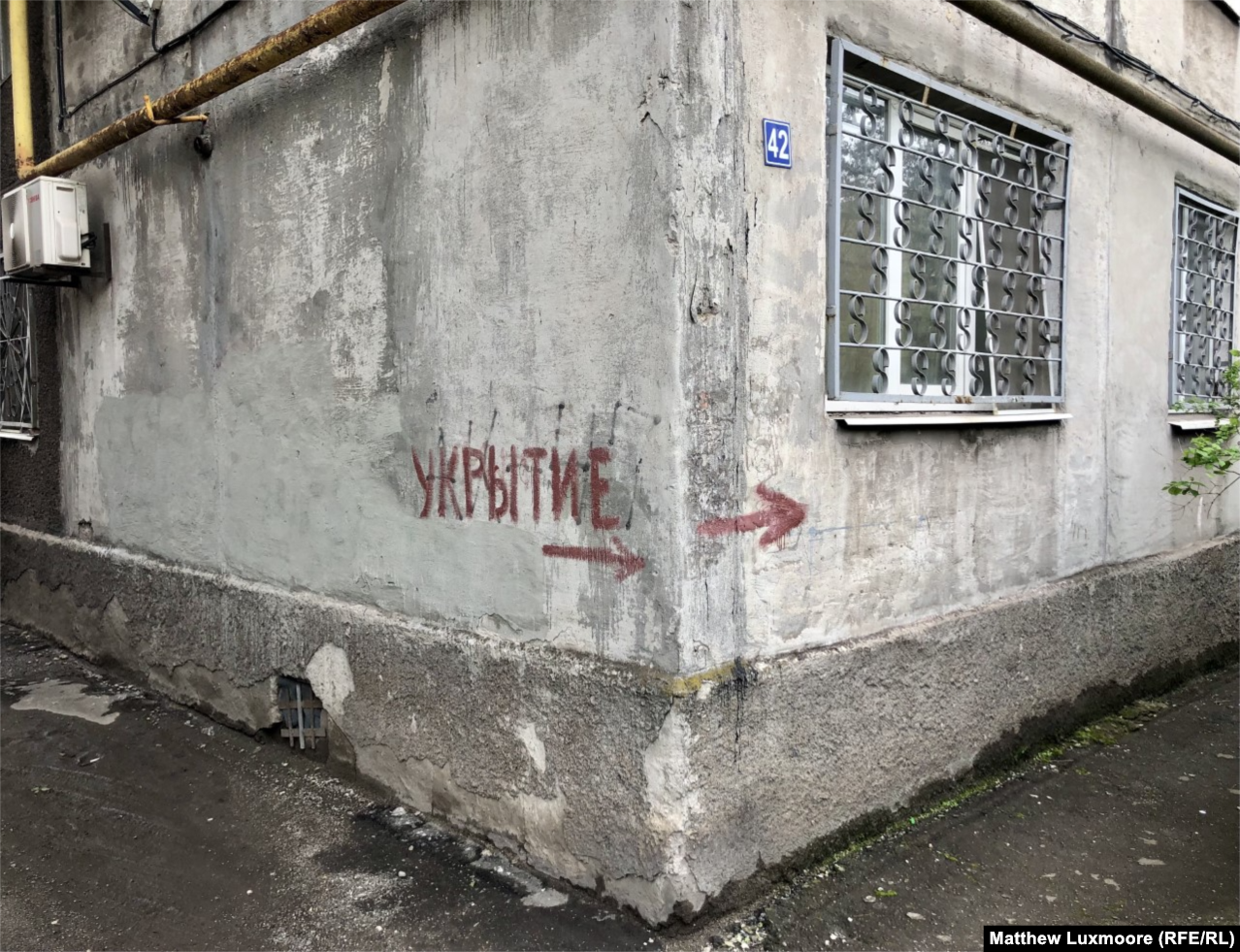 Signs throughout Mariupol indicate entrances to the bomb shelters that still dot the eastern Ukrainian city.