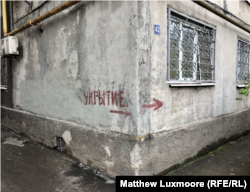 Signs throughout Mariupol indicate entrances to the bomb shelters that still dot the eastern Ukrainian city.